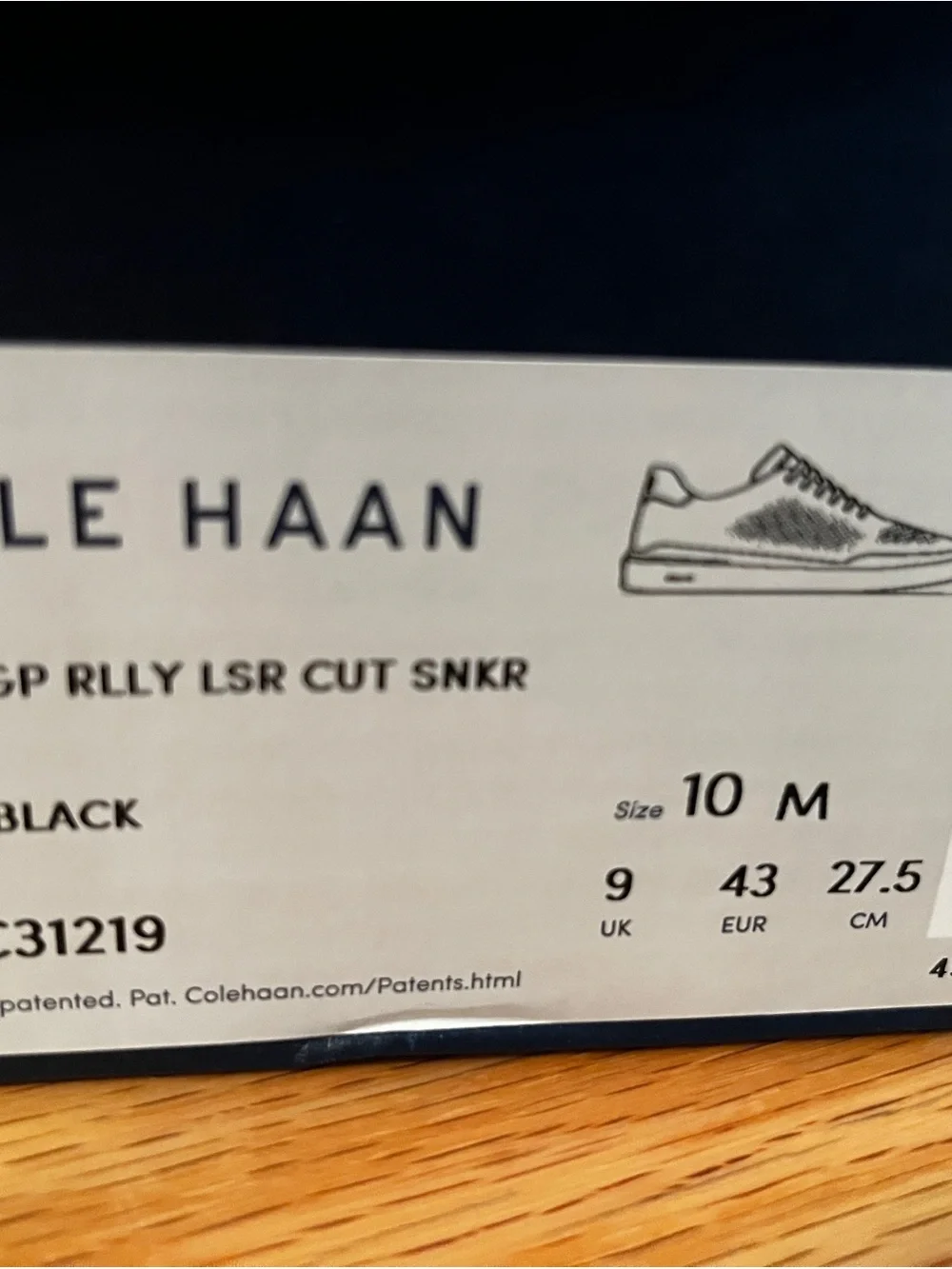 Cole Haan Black Leather Perforated Low-Top Sneakers with White Sole